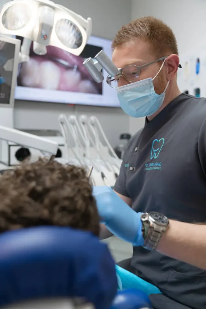 Dr. Costanzo focuses on a patient